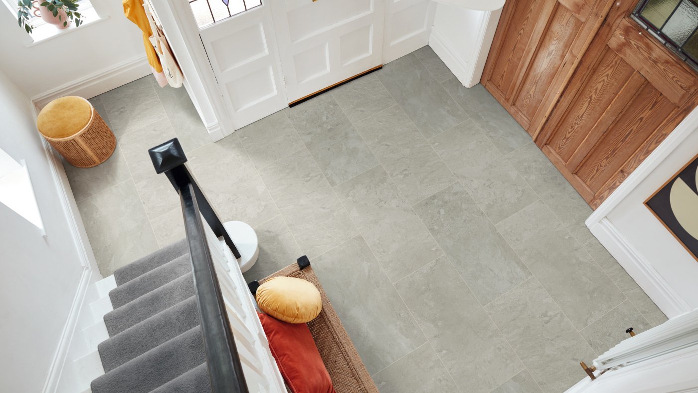 Grey stone (VGT3020 Luna Breccia Marble) flooring in a hallway