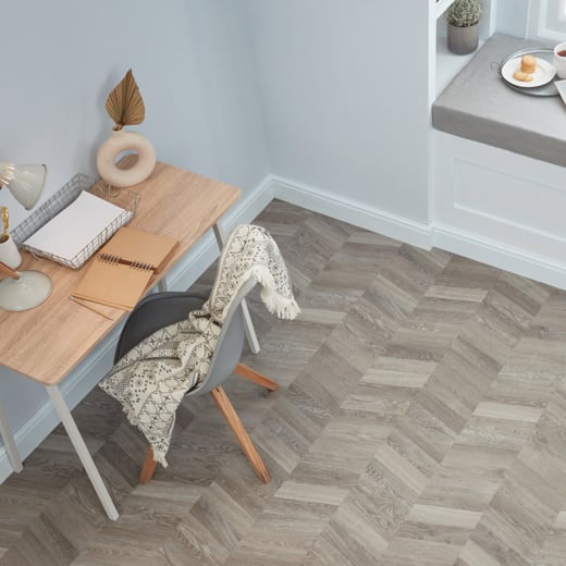 Karndean Grey Washed Oak wood flooring laid in chevron in a Home Office 