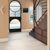 Seamless luxury meets functionality in hallway flooring.