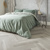 Karndean Texas grey ash herringbone wood flooring in a bedroom Van Gogh SM-VGW8239