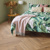 traditional character oak flooring from Karndean laid in herringbone in a bedroom Knight Tile Rubens KP146