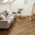 traditional character oak flooring from Karndean laid in herringbone in a living room