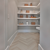 Secret pantry with Glacier Oak SM-RL21 floors in a herringbone pattern on Season 2, Episode 1 of Rock The Block