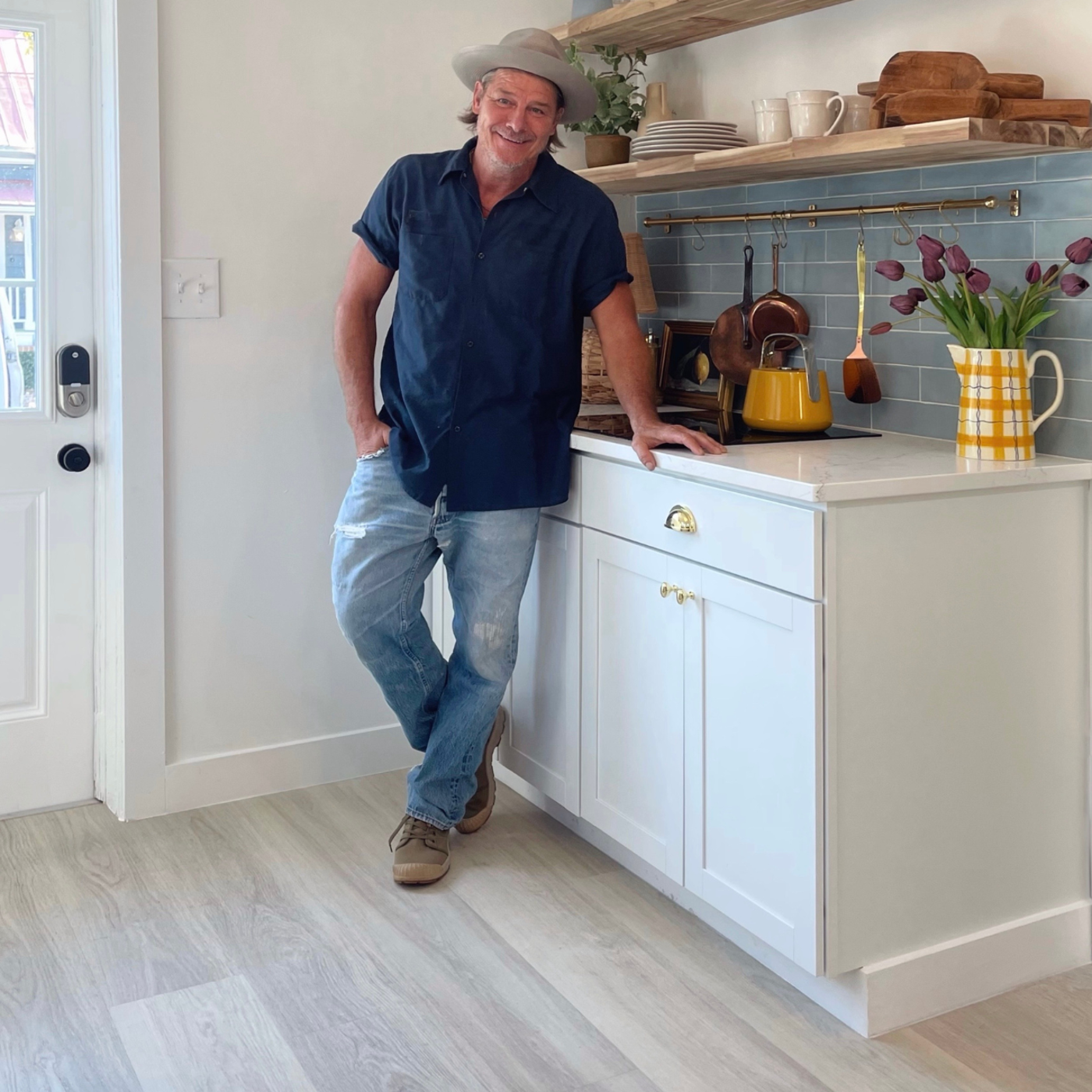 Ty Pennington in the quaint cottage kitchen with Ivory Brushed Oak RKP8217 floors he designed