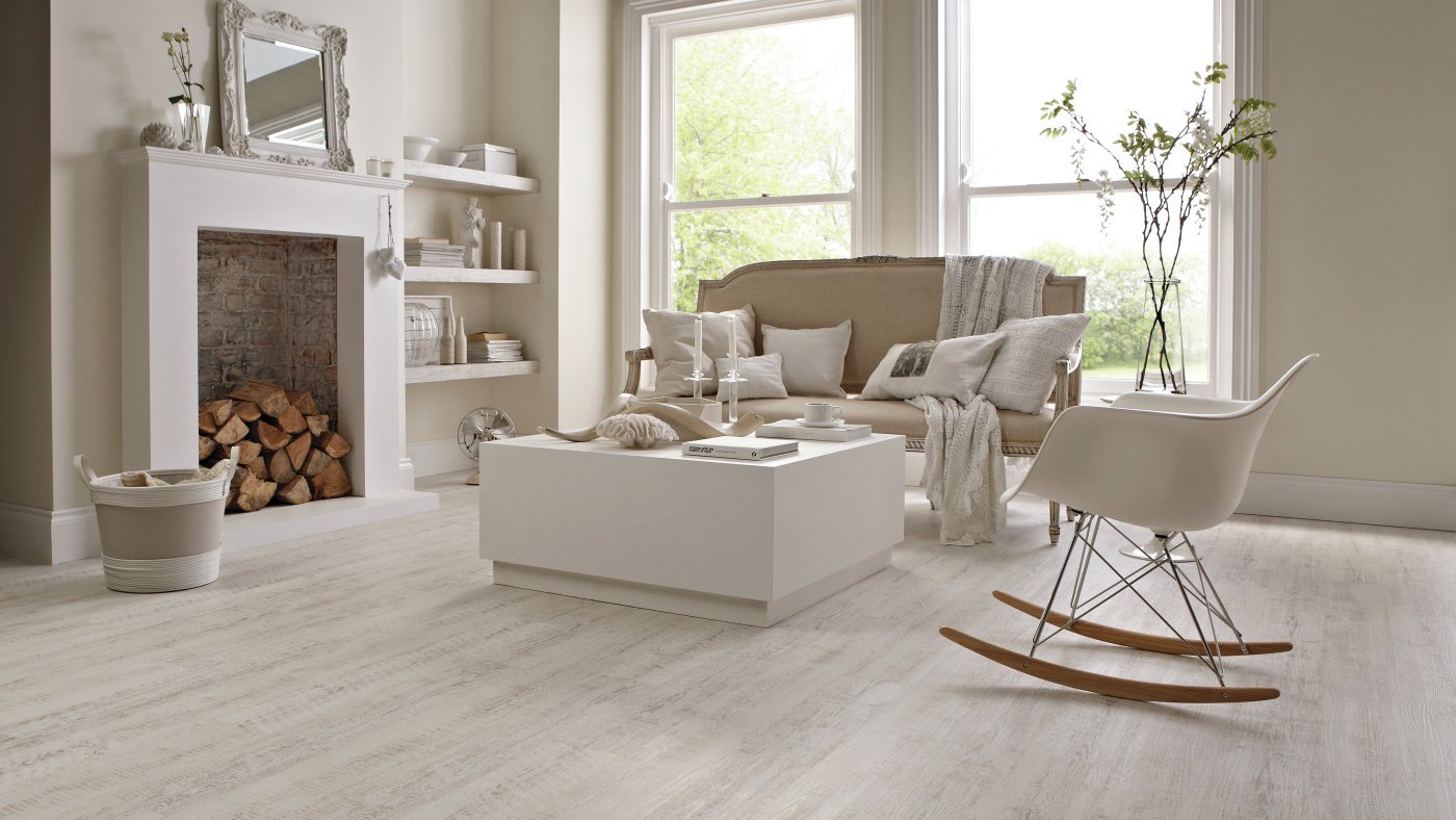 These stripped down, chalky white painted planks feature hints of the natural wood, creating an authentic coastal feel without the upkeep of natural hardwood. Bedroom with Knight Tile SCB-KP105-6