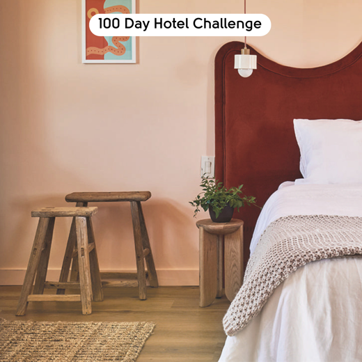 Golden Danish Oak LLP359 floors in a motel room with a maroon headboard designed by Brian Kleinschmidt in 100 Day Hotel Challenge