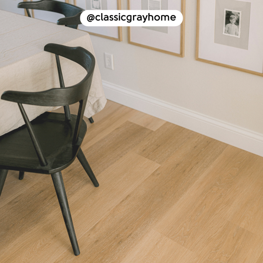 Overhead of Warm Ash RKP8103 floors and a dining room table; photo credit: @classicgrayhome