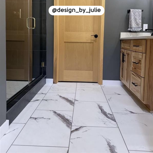 Brunella Marble RKT3013-G floors in a dark bathroom; photo credit: @design_by_julie